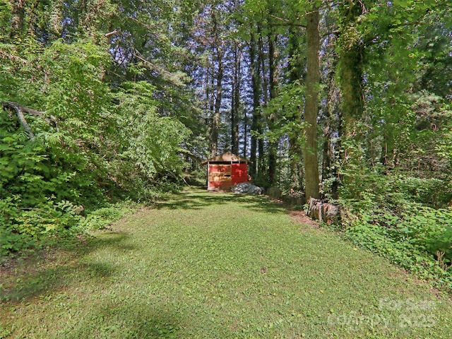 32 Saunooke Rd, Asheville, NC 28805 - view of grassy yard with a wooded view