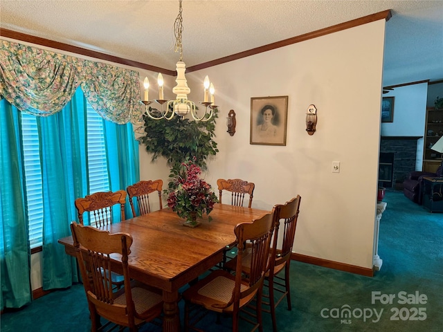 5816 Scotland Yard Rd, Rock Hill, SC 29732 - dining area with carpet flooring, a chandelier, ornamental molding, a textured ceiling, and a stone fireplace