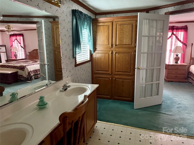 5816 Scotland Yard Rd, Rock Hill, SC 29732 - bathroom with ensuite bathroom, healthy amount of natural light, wallpapered walls, double vanity, and crown molding