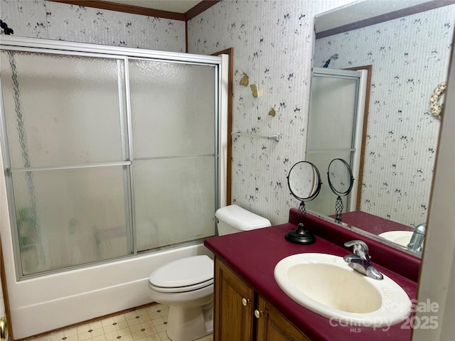 5816 Scotland Yard Rd, Rock Hill, SC 29732 - bathroom featuring wallpapered walls, vanity, tile patterned floors, shower / bath combination with glass door, and crown molding