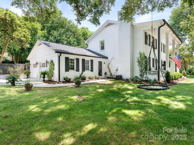 3001 Colony Rd, Charlotte, NC 28211 - view of front facade with a garage, a chimney, and brick siding