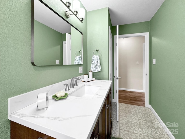 463 Golf Course Rd, Clyde, NC 28721 - bathroom featuring a textured wall and vanity