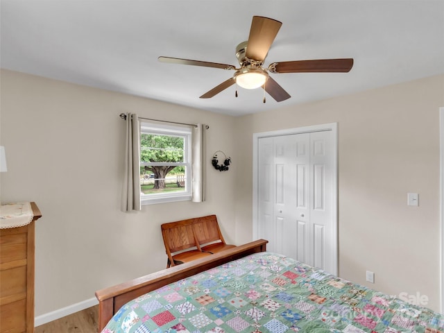 463 Golf Course Rd, Clyde, NC 28721 - bedroom with wood finished floors, a closet, and ceiling fan
