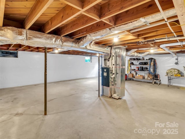 463 Golf Course Rd, Clyde, NC 28721 - basement featuring heating unit