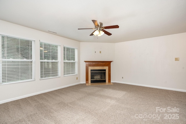 1432 Matthew Allen Cir, Kannapolis, NC 28081 - unfurnished living room featuring ceiling fan, carpet flooring, and a fireplace with flush hearth