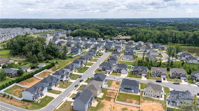 2110 Owls View Ln, Colfax, NC 27235 - aerial perspective of suburban area with a heavily wooded area