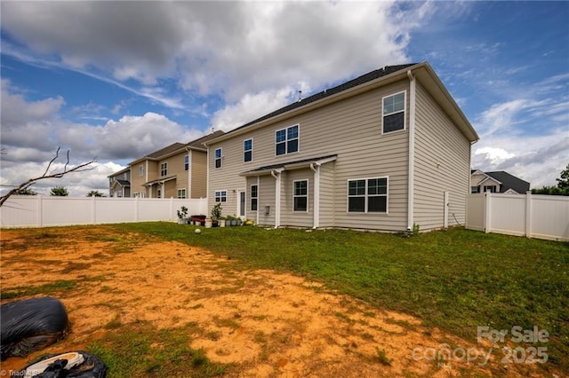 2110 Owls View Ln, Colfax, NC 27235 - back of house with a fenced backyard
