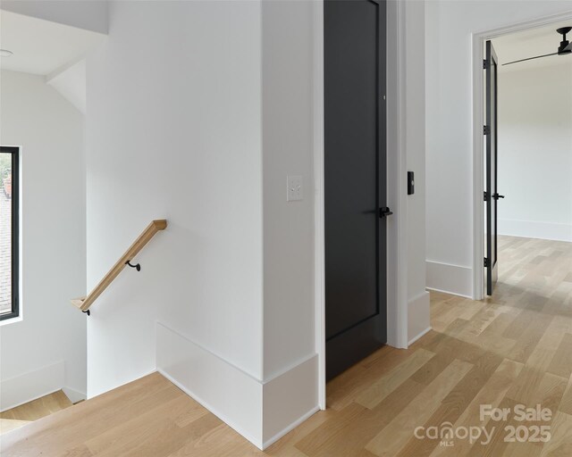 1511 Waverly Ave, Charlotte, NC 28203 - corridor featuring an upstairs landing and light wood-type flooring