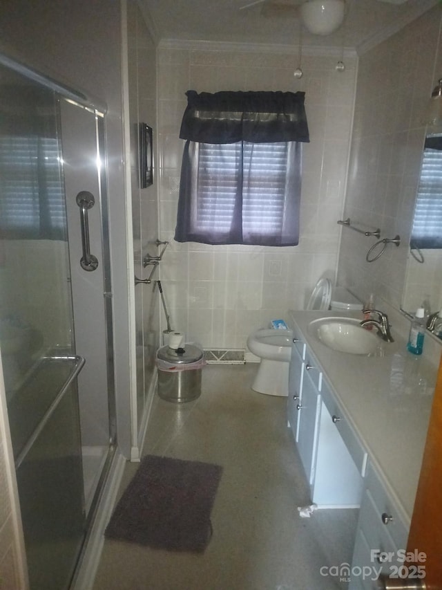 2815 Highland Dr, Lincolnton, NC 28092 - bathroom with vanity, tile walls, a shower stall, and ornamental molding