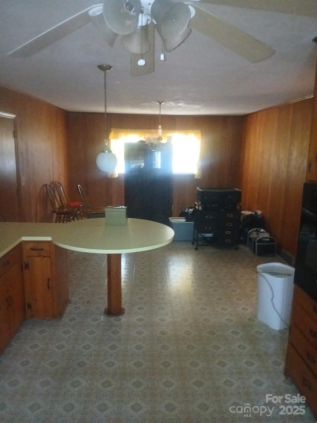 2815 Highland Dr, Lincolnton, NC 28092 - dining area with wooden walls and ceiling fan
