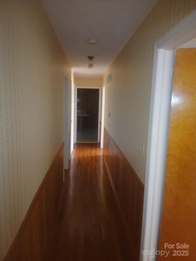 2815 Highland Dr, Lincolnton, NC 28092 - corridor with wood finished floors, ornamental molding, wallpapered walls, and a wainscoted wall