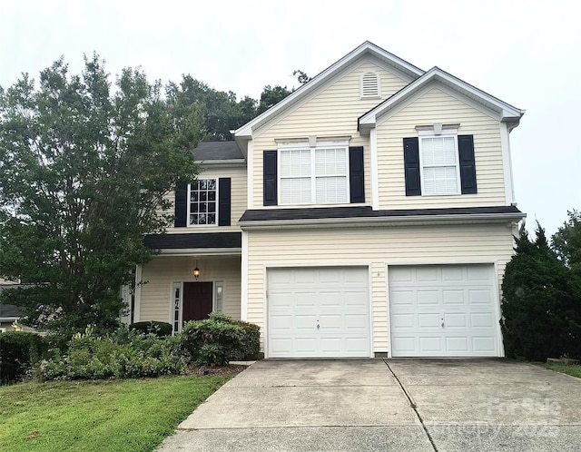 10825 Traders Ct, Davidson, NC 28036 - traditional home with an attached garage, driveway, and a front lawn