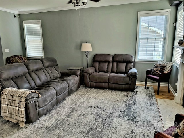10825 Traders Ct, Davidson, NC 28036 - living area with crown molding, wood finished floors, and ceiling fan