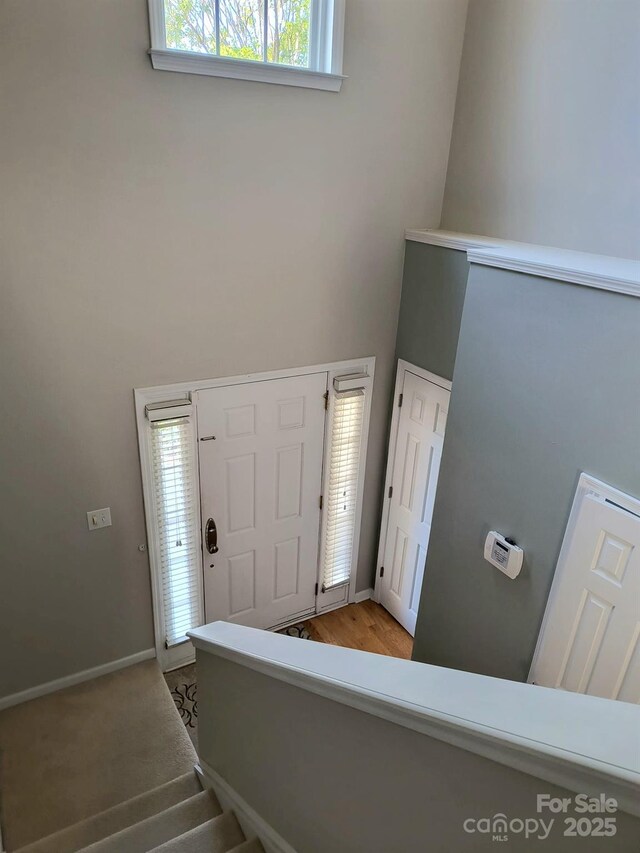 10825 Traders Ct, Davidson, NC 28036 - entryway featuring a towering ceiling and plenty of natural light