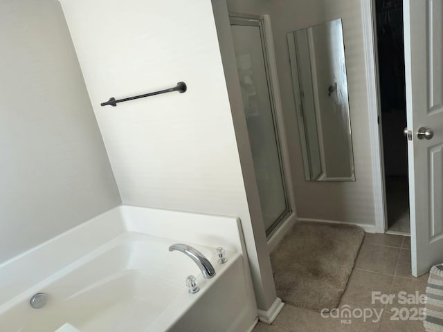 10825 Traders Ct, Davidson, NC 28036 - full bathroom featuring a bath, a shower stall, and tile patterned floors