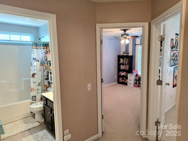 10825 Traders Ct, Davidson, NC 28036 - full bathroom with vanity, ceiling fan, and shower / tub combo with curtain