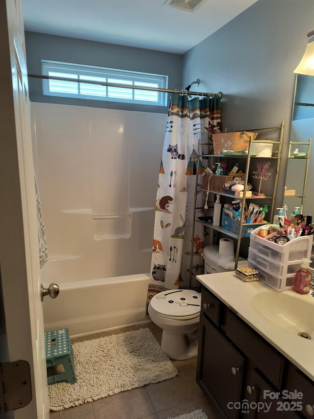10825 Traders Ct, Davidson, NC 28036 - bathroom featuring tile patterned flooring, vanity, and shower / bath combo with shower curtain