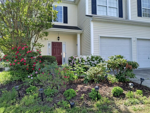 10825 Traders Ct, Davidson, NC 28036 - entrance to property with an attached garage