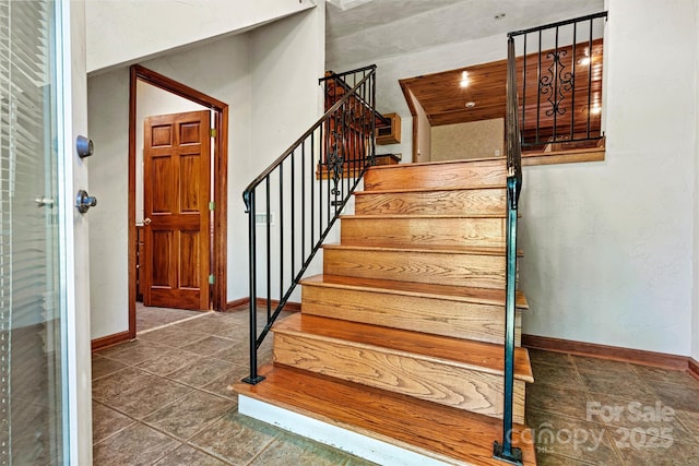 3724 County Home Rd, Conover, NC 28613 - stairway featuring baseboards