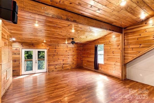 3724 County Home Rd, Conover, NC 28613 - unfurnished living room with french doors, vaulted ceiling, wood finished floors, ceiling fan, and wooden ceiling