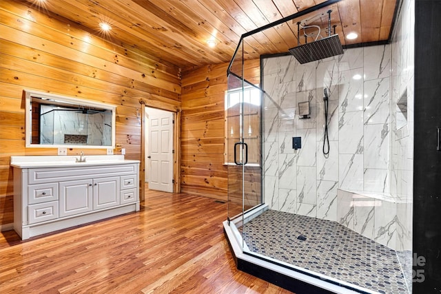 3724 County Home Rd, Conover, NC 28613 - full bathroom with a marble finish shower, wood ceiling, vanity, wood finished floors, and wooden walls