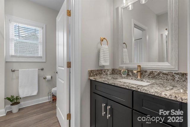 4210 Holly Cir NE, Conover, NC 28613 - full bathroom with vanity and wood finished floors