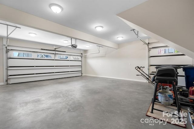 4210 Holly Cir NE, Conover, NC 28613 - garage with a garage door opener and baseboards