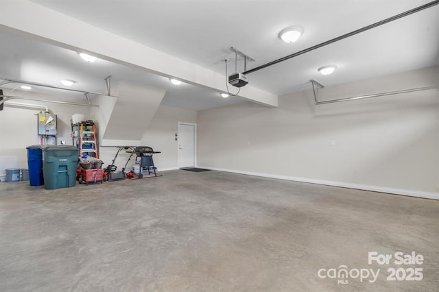 4210 Holly Cir NE, Conover, NC 28613 - garage featuring a garage door opener and baseboards