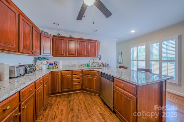 8 Creekside Way, Asheville, NC 28804 - kitchen with stainless steel dishwasher, ornamental molding, a peninsula, dark wood-type flooring, and ceiling fan