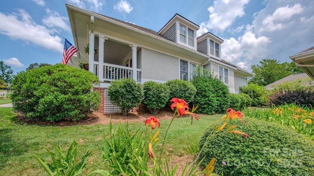 8 Creekside Way, Asheville, NC 28804 - view of side of home with a yard and stucco siding