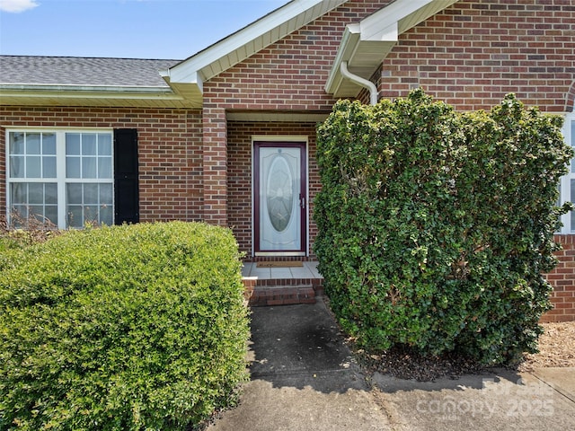 3906 Brickfield St, Hickory, NC 28602 - entrance to property featuring brick siding and a shingled roof
