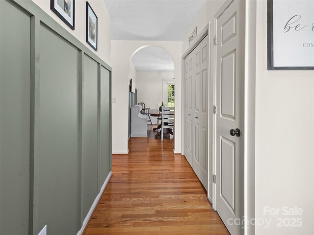 3906 Brickfield St, Hickory, NC 28602 - corridor with arched walkways and light wood-style flooring