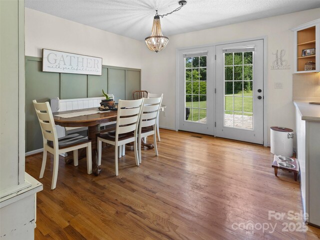 3906 Brickfield St, Hickory, NC 28602 - dining room with a chandelier and wood finished floors