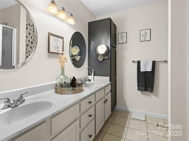 3906 Brickfield St, Hickory, NC 28602 - full bathroom with double vanity, tile patterned floors, and an enclosed shower