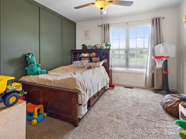 3906 Brickfield St, Hickory, NC 28602 - carpeted bedroom featuring a closet and ceiling fan