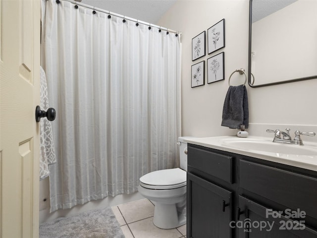 3906 Brickfield St, Hickory, NC 28602 - bathroom featuring tile patterned floors, vanity, and a textured ceiling
