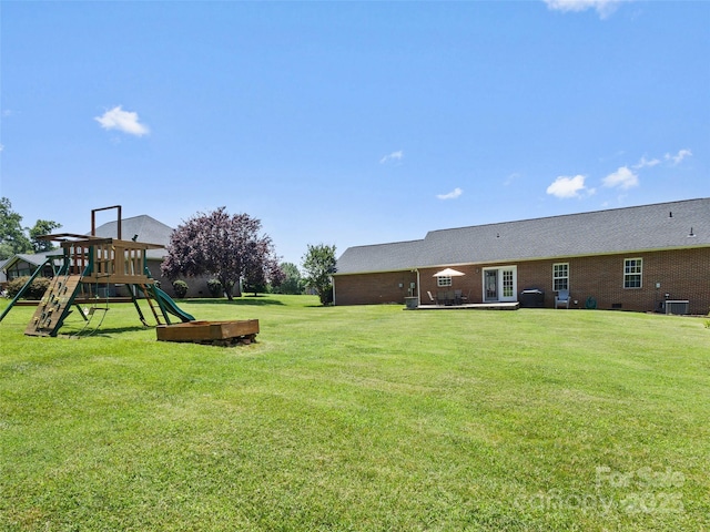 3906 Brickfield St, Hickory, NC 28602 - view of green lawn featuring a playground