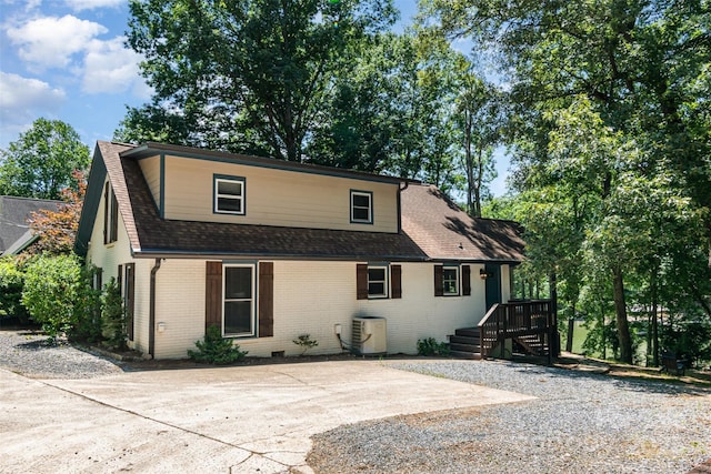 353 Whippoorwill Rd, Mooresville, NC 28117 - view of front of house featuring brick siding and a shingled roof