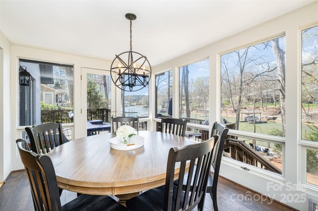 353 Whippoorwill Rd, Mooresville, NC 28117 - sunroom featuring a chandelier and a water view