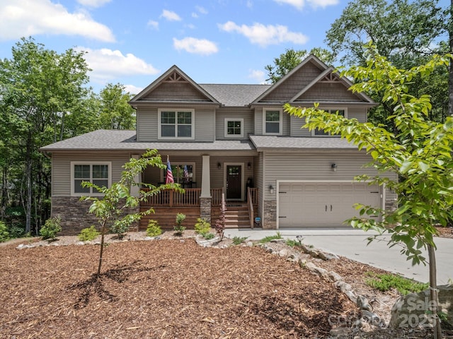 714 Bolt Rd, Lake Lure, NC 28746 - craftsman-style house featuring a porch, stone siding, a shingled roof, and concrete driveway