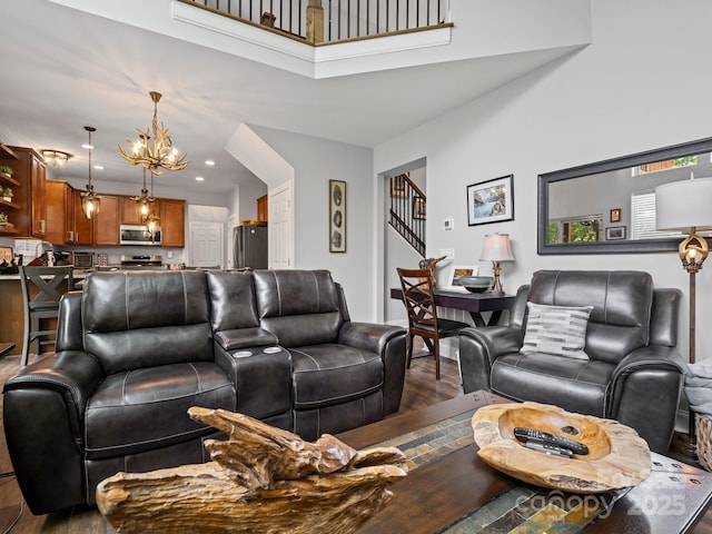 714 Bolt Rd, Lake Lure, NC 28746 - living area with wood finished floors, a chandelier, stairs, recessed lighting, and a towering ceiling