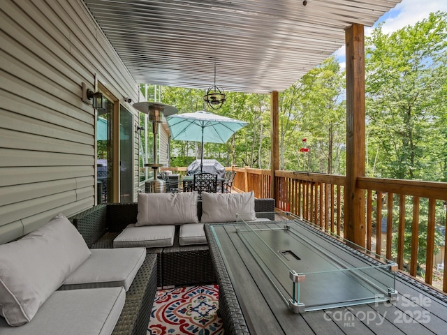 714 Bolt Rd, Lake Lure, NC 28746 - wooden deck with outdoor dining space and an outdoor living space