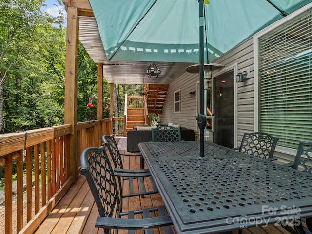 714 Bolt Rd, Lake Lure, NC 28746 - wooden deck featuring outdoor dining area and stairway