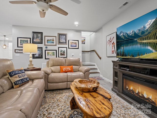 714 Bolt Rd, Lake Lure, NC 28746 - living room with a ceiling fan, stairway, and wood finished floors