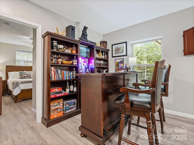 714 Bolt Rd, Lake Lure, NC 28746 - indoor dry bar featuring light wood-style flooring and ceiling fan