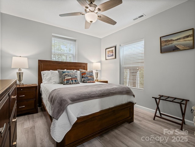 714 Bolt Rd, Lake Lure, NC 28746 - bedroom featuring light wood-style flooring and ceiling fan