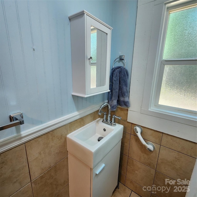 703/705 Smith St, Kannapolis, NC 28083 - half bath featuring healthy amount of natural light and tile walls