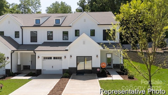 622 Station St Unit 48, Clover, SC 29710 - modern farmhouse style home with driveway, an attached garage, roof with shingles, and french doors