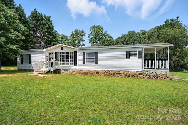 1778 N Ingleside Farm Rd, Iron Station, NC 28080 - rear view of property with a lawn