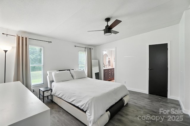 1778 N Ingleside Farm Rd, Iron Station, NC 28080 - bedroom featuring multiple windows, dark wood-style flooring, ceiling fan, ensuite bath, and vaulted ceiling